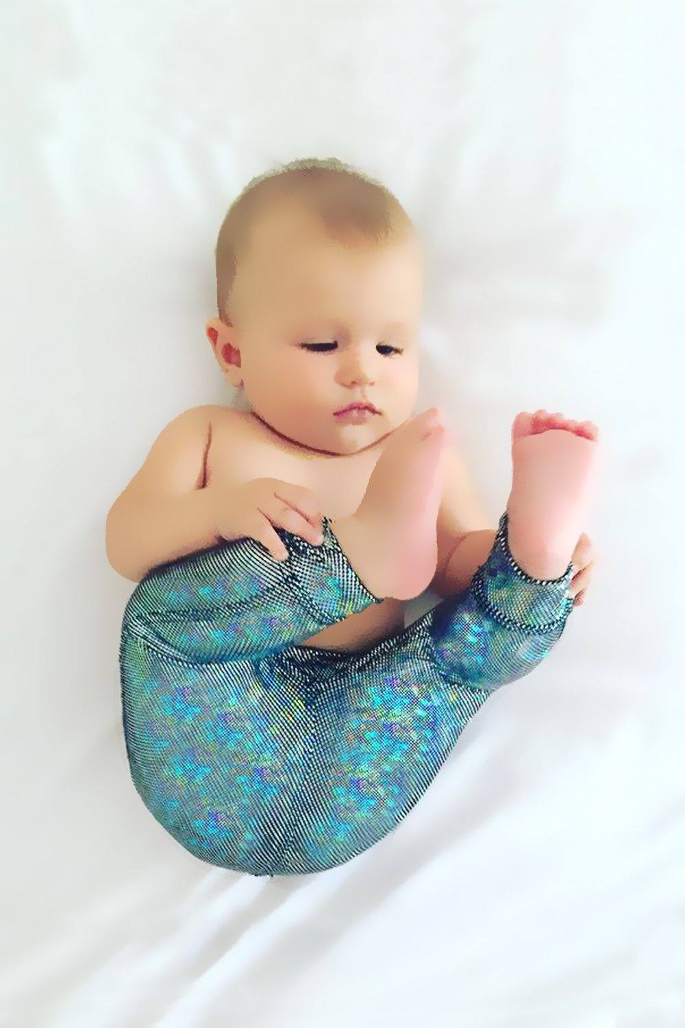 Sea Dragon Studio holographic gender-neutral kids festival wear — festival and rave wear, worn at festival.