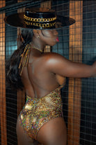 Sea Dragon Studio holographic fringe bodysuit in motion - festival rave bodysuit fringe moving at EDM event.